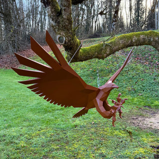 Sculpture d'art en acier d'un aigle peint en marron fabriquée par l'artiste Cyril Maire
