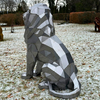 Sculpture d'art en métal d'un lion en acier fabriquée par l'artiste Cyril Maire