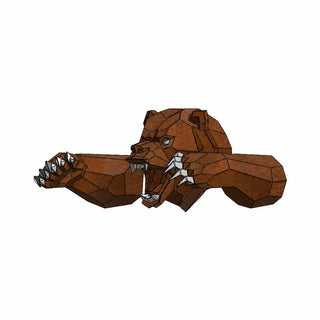 Sculpture murale d'une tête d'ours en métal fabriquée par l'artiste Cyril Maire