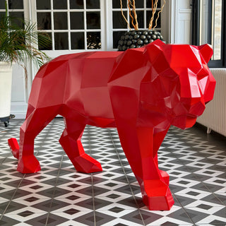 Sculpture d'art en acier d'un tigre peint en rouge fabriquée par l'artiste Cyril Maire