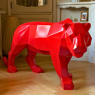 Sculpture d'art en acier d'un tigre peint en rouge fabriquée par l'artiste Cyril Maire