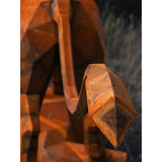 Sculpture d'un lion en acier corten réalisée par l'artiste Cyril Maire