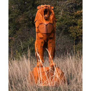 Sculpture d'un lion en acier corten réalisée par l'artiste Cyril Maire